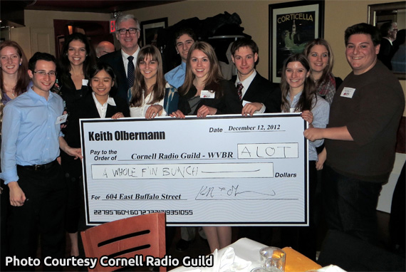 Keith Olbermann presents WVBR alumni with giant check for studio move, 2012