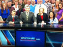 Caroline Gable has recently exited WUTR. She's next to Joe Parker behind the anchor desk in this shot from September 2011. (Click for full-size)